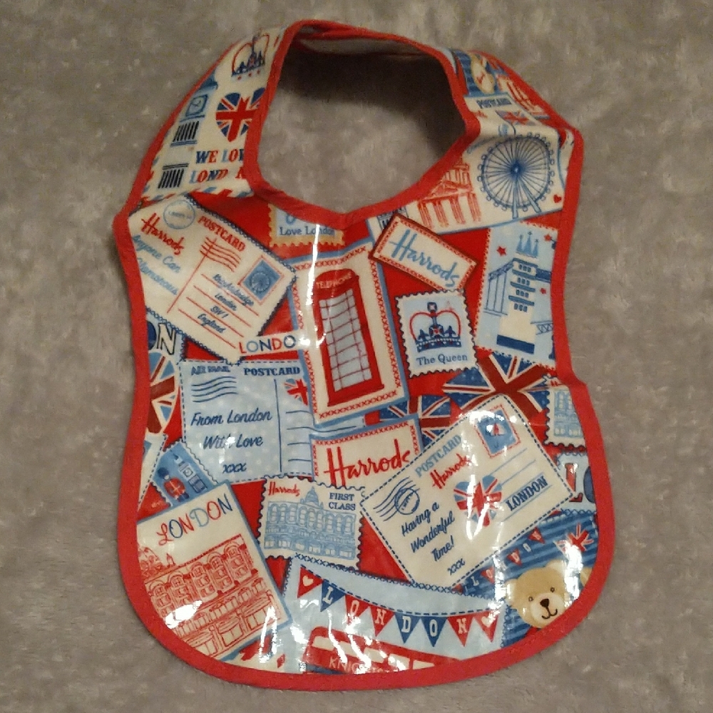 Harrods Red, Blue and White Vinyl Baby Bib with London Postcard Print